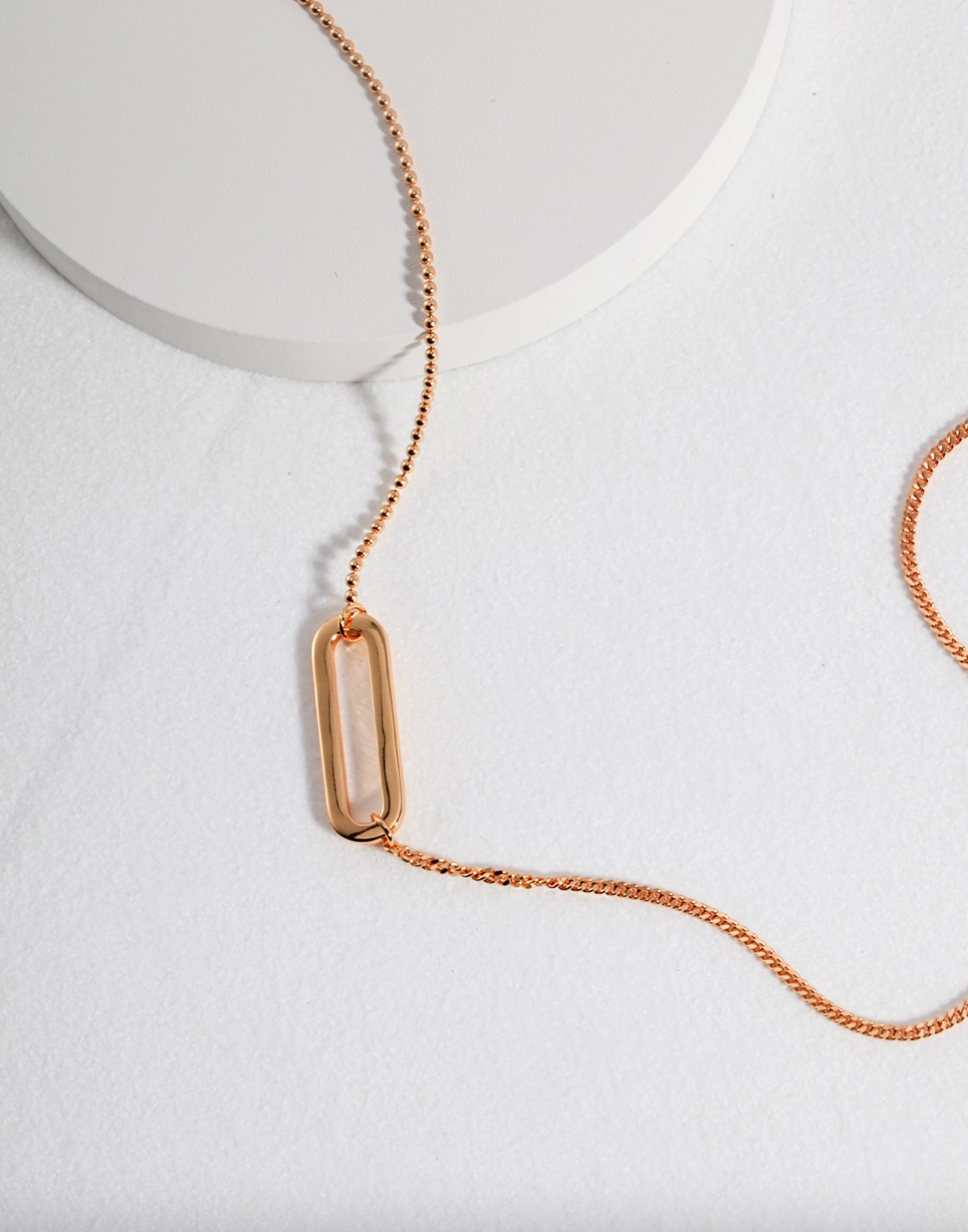  Simple Icon Necklace, featuring a clean, modern pendant in either a gold or silver finish