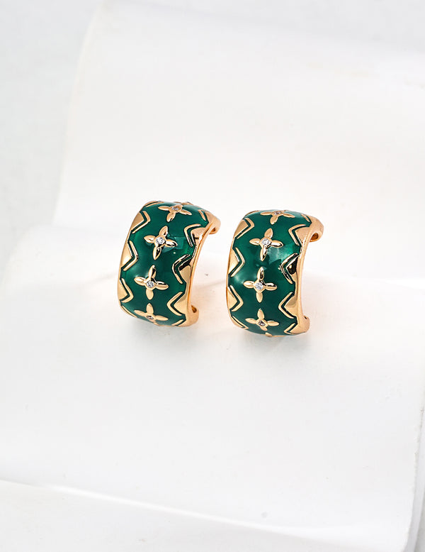 Vintage-inspired Charlotte Vert Earrings featuring 18ct gold vermeil, green cold enamel, and cubic zirconia, combining timeless elegance with modern craftsmanship.